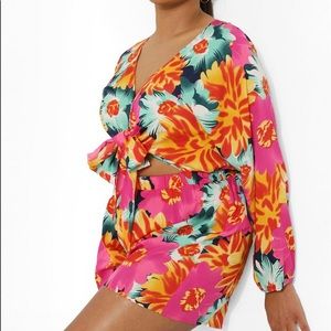 Floral Romper- Tie front. Never worn